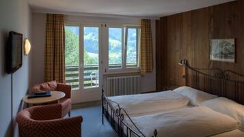 Panoramic Double Room, Balcony, Mountain View (Eiger) | Down comforters, individually decorated, individually furnished, desk