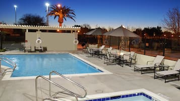 Outdoor pool, open 7:00 AM to 10:00 PM, pool umbrellas, pool loungers