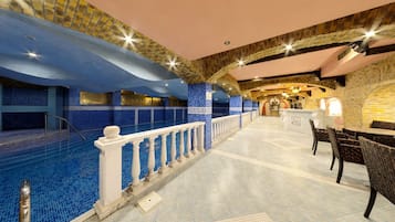 Indoor pool, seasonal outdoor pool, pool umbrellas, sun loungers