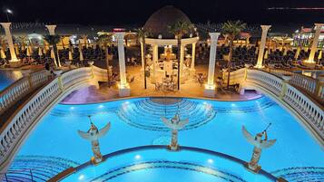 Indoor pool, seasonal outdoor pool, pool umbrellas, pool loungers