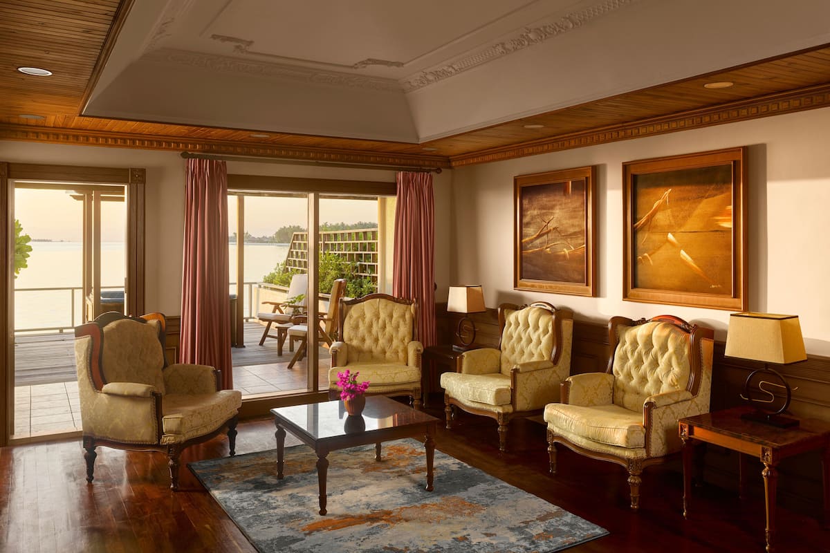 executive suite, 2 double beds (two bedroom overwater suite) | living area | tv