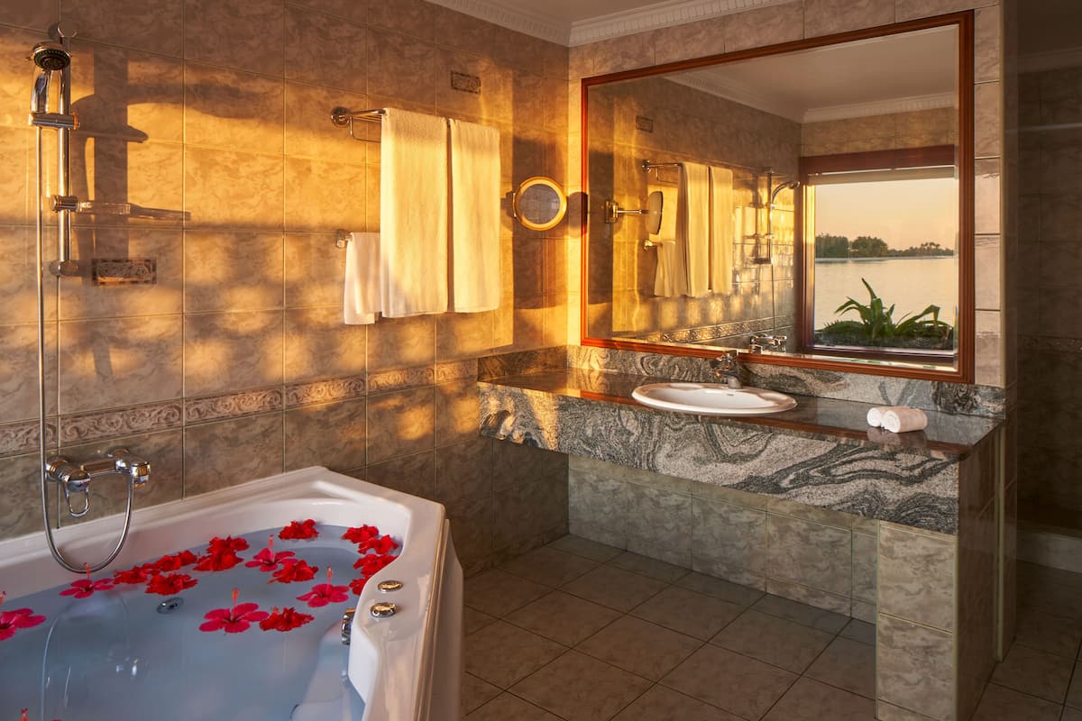 executive suite, 2 double beds (two bedroom overwater suite) | bathroom | shower, designer toiletries, hair dryer, bathrobes