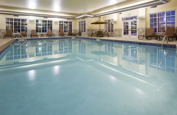 Indoor pool, open 6 AM to 11 PM, pool loungers
