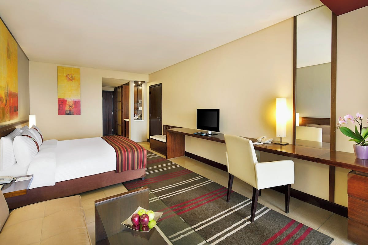 Free minibar, in-room safe, desk, iron/ironing board