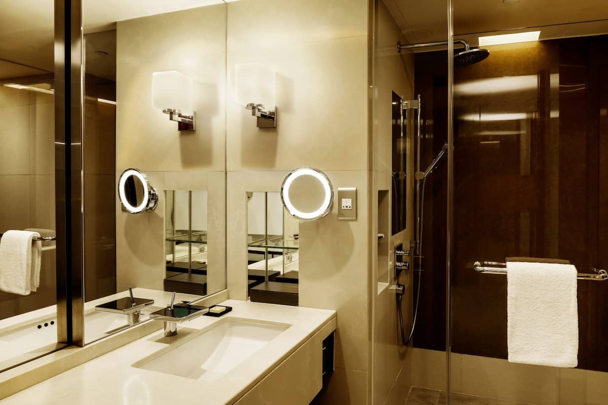 hair dryer, bathrobes, slippers, towels