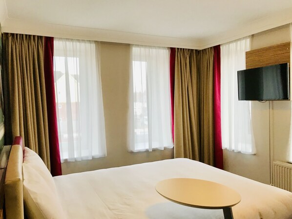 Desk, laptop workspace, free WiFi, bed sheets