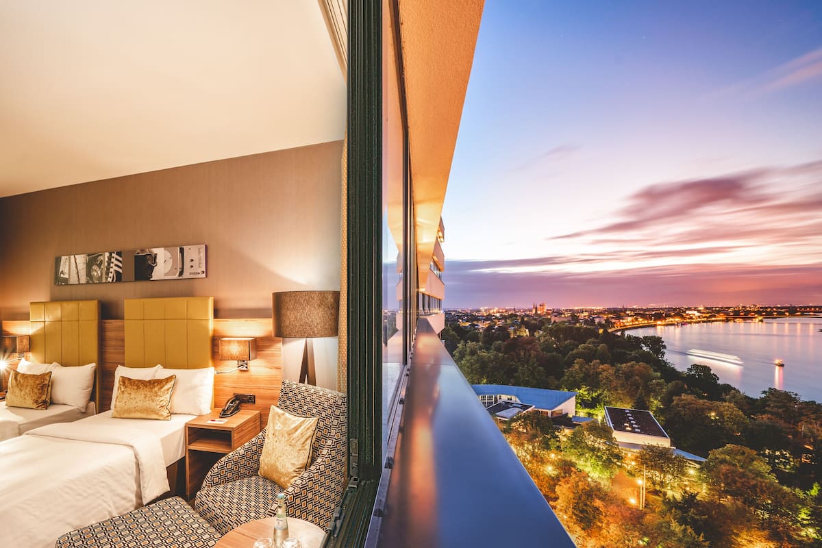 deluxe room, 2 single beds, non smoking, river view | 1 bedroom, in-room safe, desk, blackout curtains