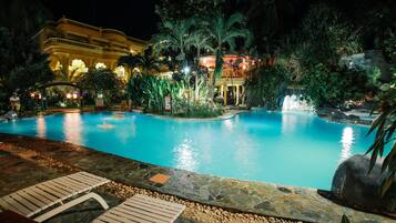 3 outdoor pools, open 6:00 AM to 10 PM, pool loungers
