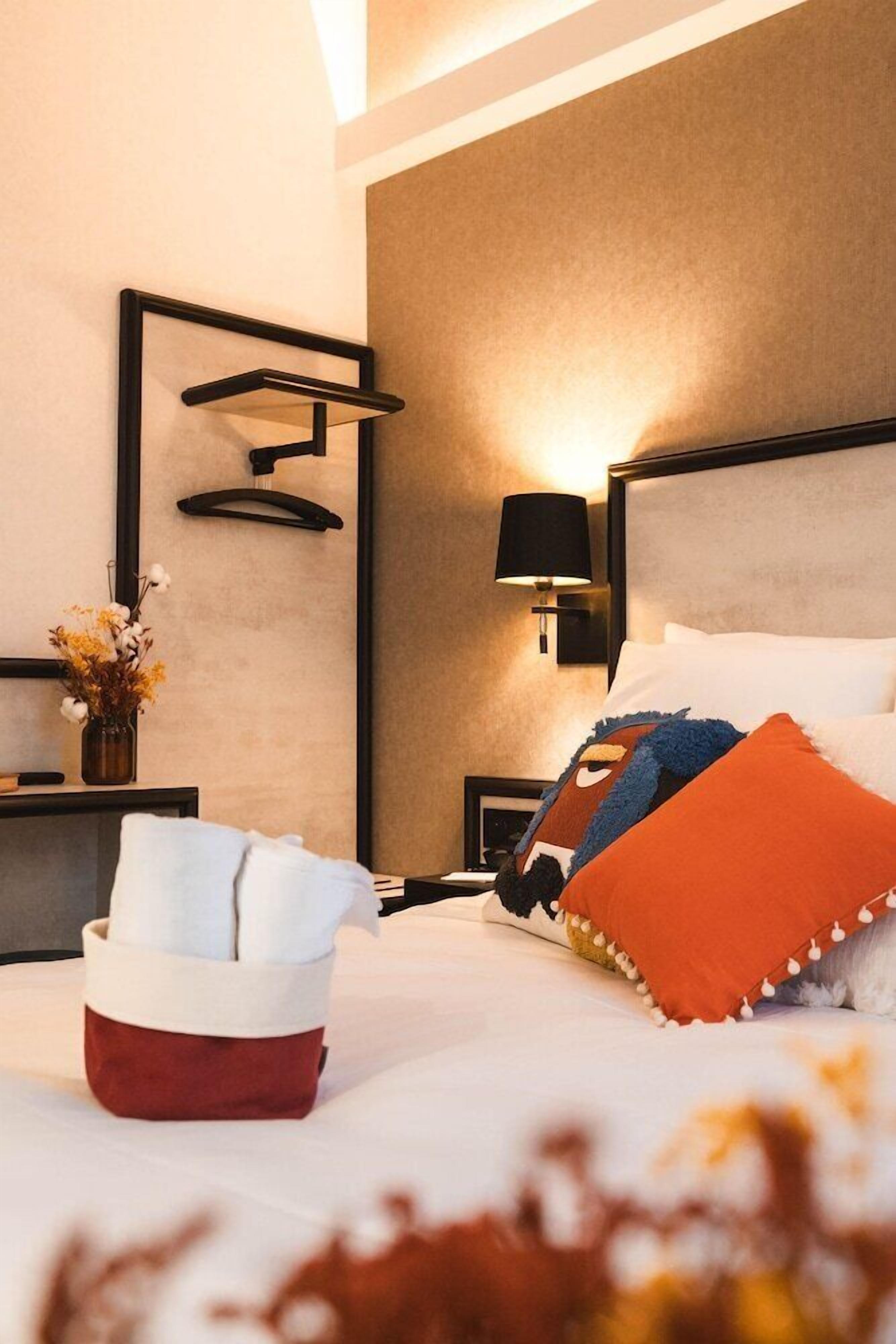 Premium bedding, desk, laptop workspace, soundproofing