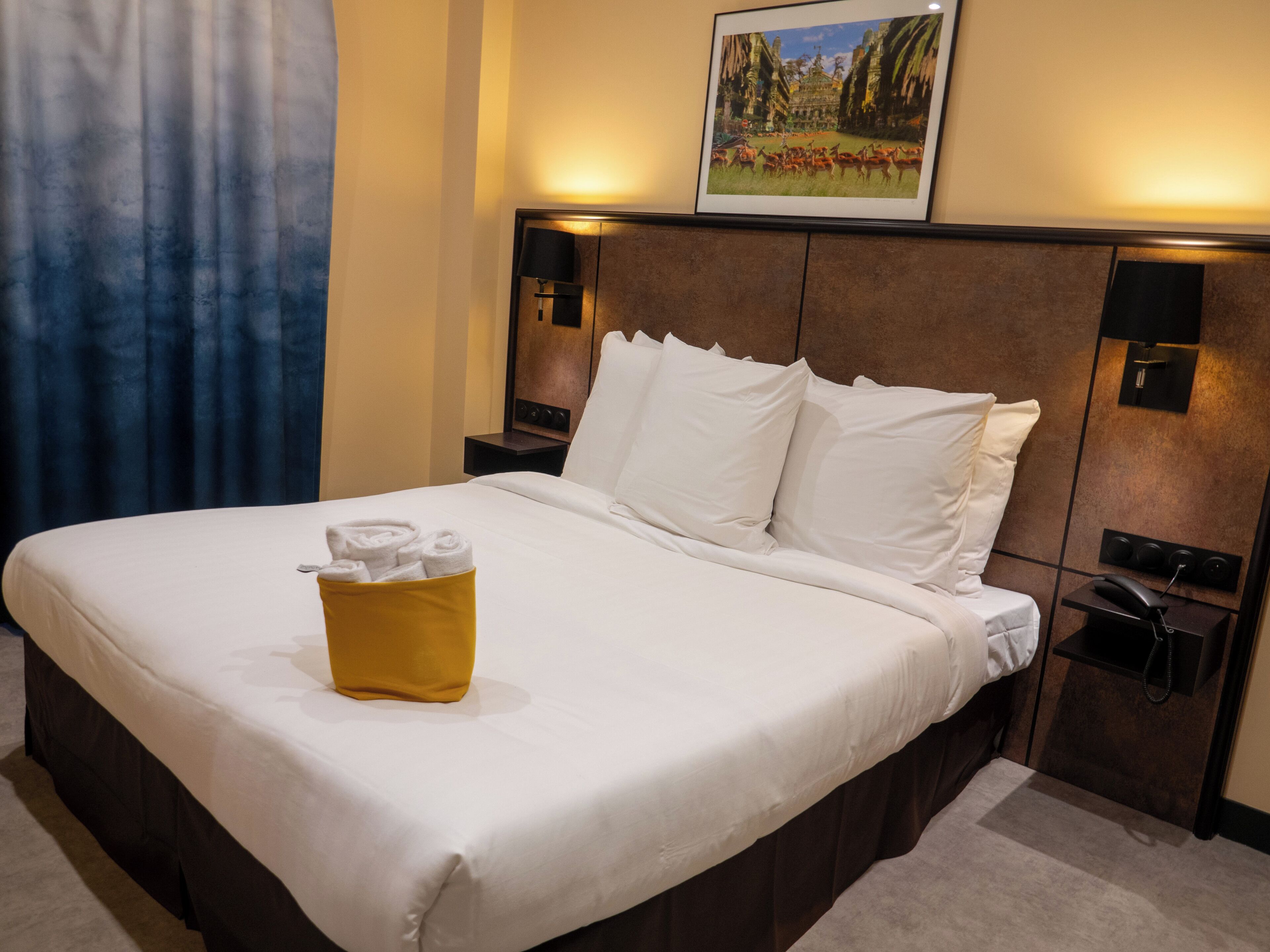 Premium bedding, desk, laptop workspace, soundproofing