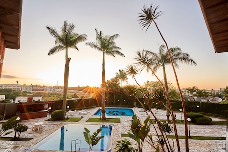 2 outdoor pools, sun loungers