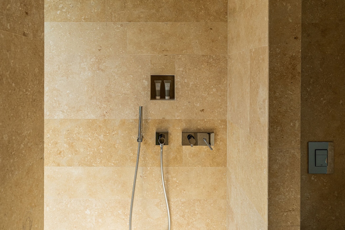 shower, rainfall showerhead, designer toiletries, hair dryer