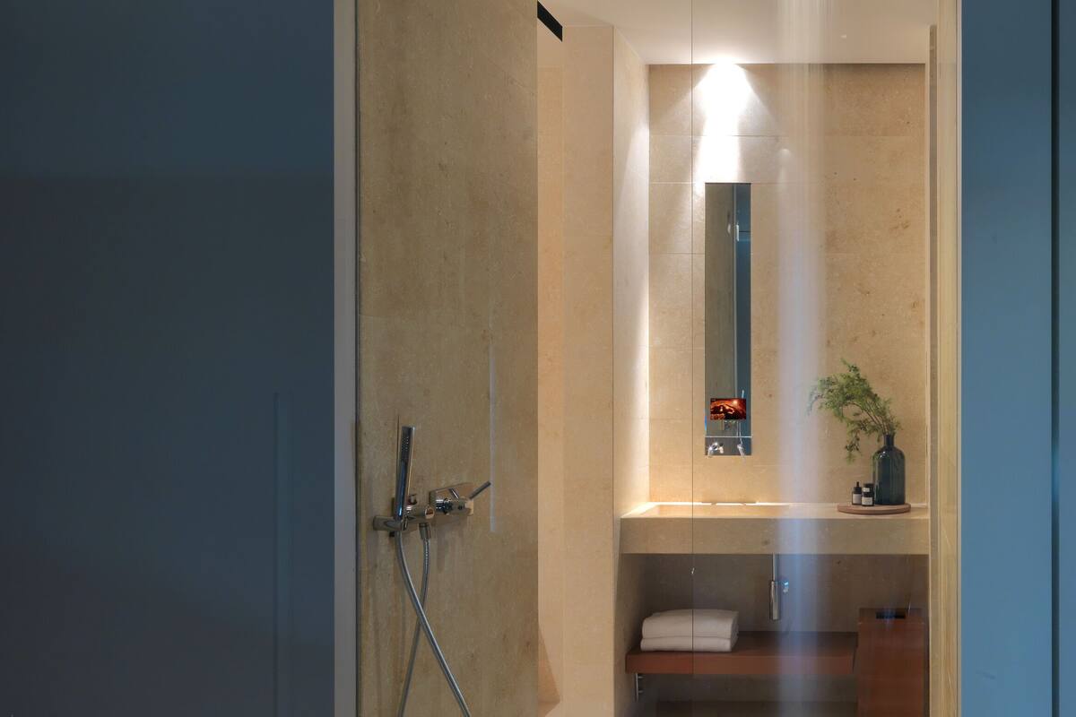 hypo-allergenic bedding, down duvets, minibar, in-room safe