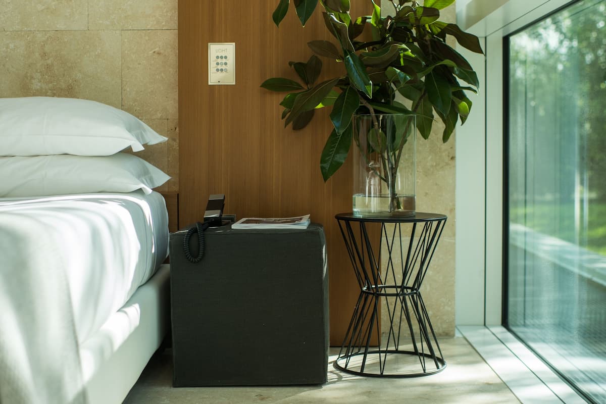 hypo-allergenic bedding, down duvets, minibar, in-room safe