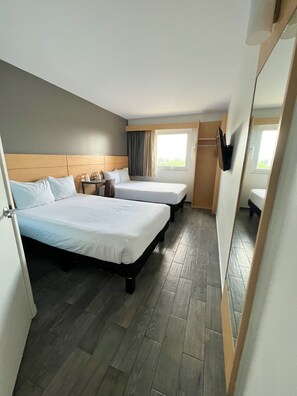 Double Room, 2 Double Beds | Bathroom | Eco-friendly toiletries, hair dryer, towels