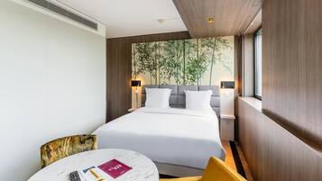 Ropa de cama de alta calidad y minibar