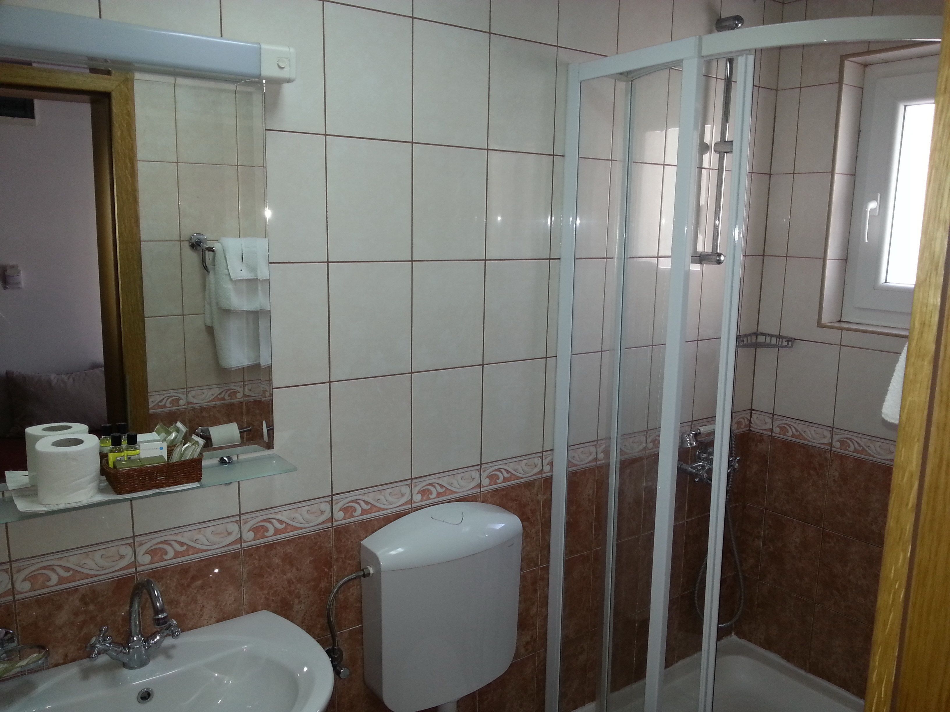 shower, hair dryer, bathrobes, slippers