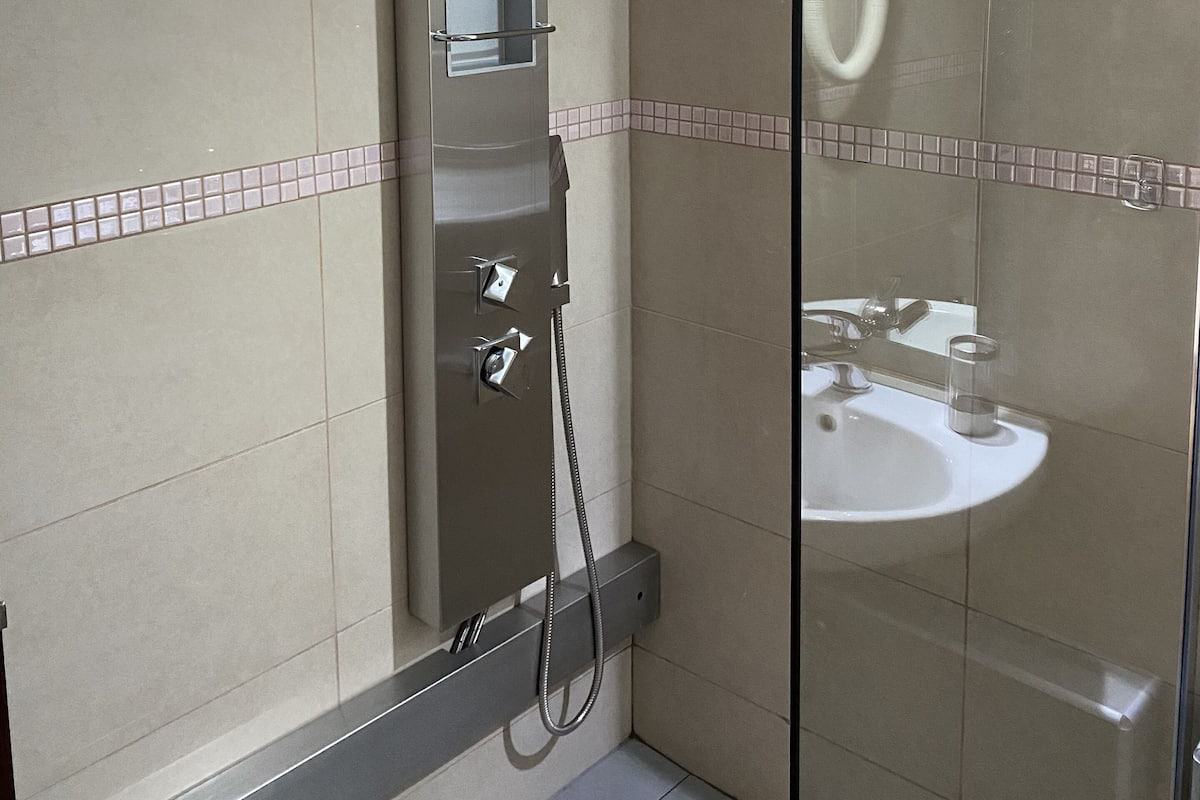 double room, 1 double bed, fireplace, mountain view | bathroom | designer toiletries, hair dryer, slippers, towels