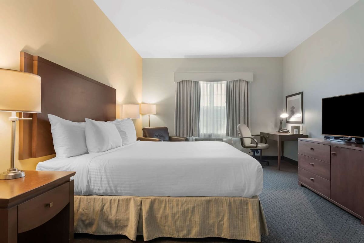 Premium bedding, down comforters, pillowtop beds, in-room safe