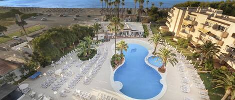 Outdoor pool, pool umbrellas, pool loungers