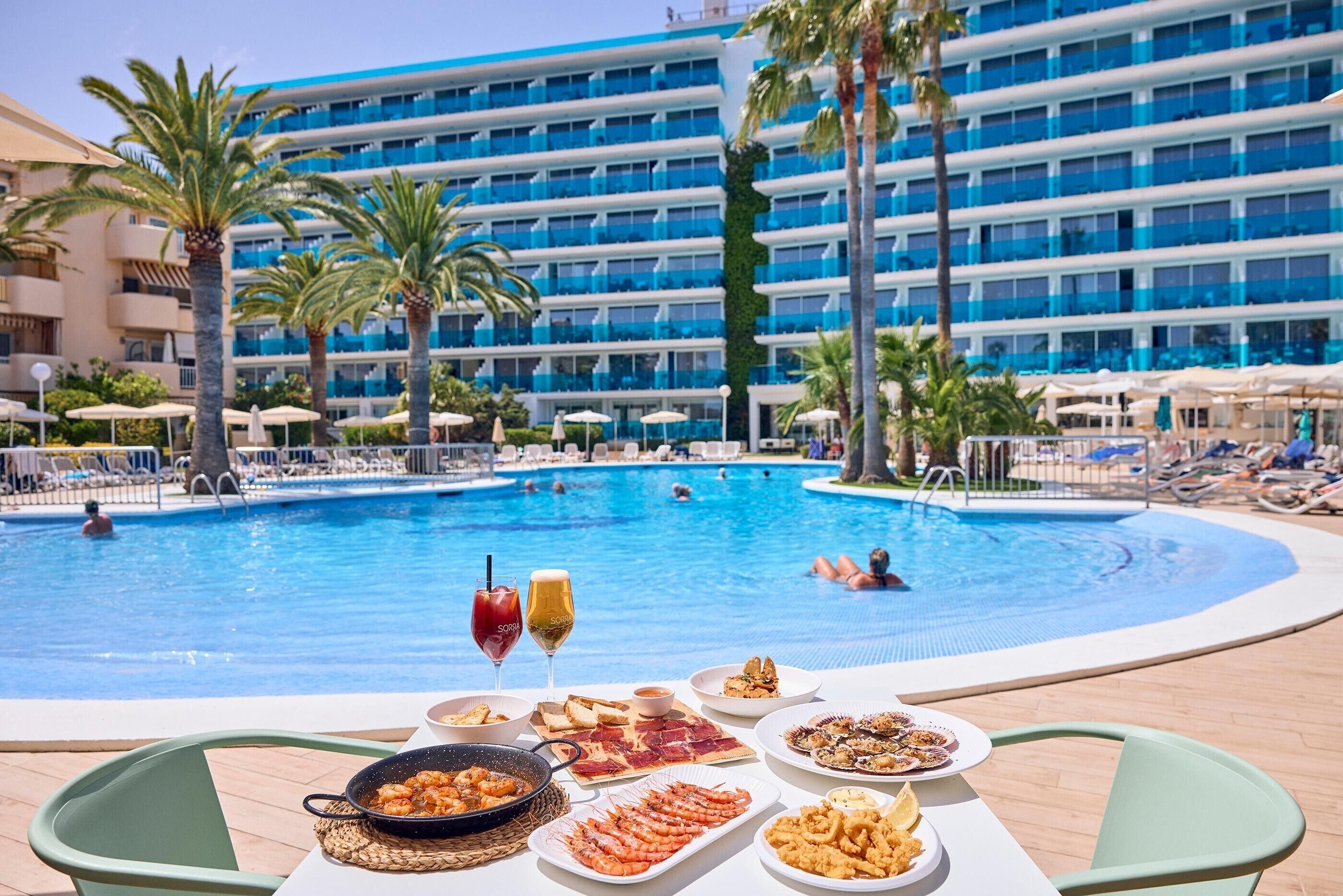 Outdoor pool, pool umbrellas, pool loungers