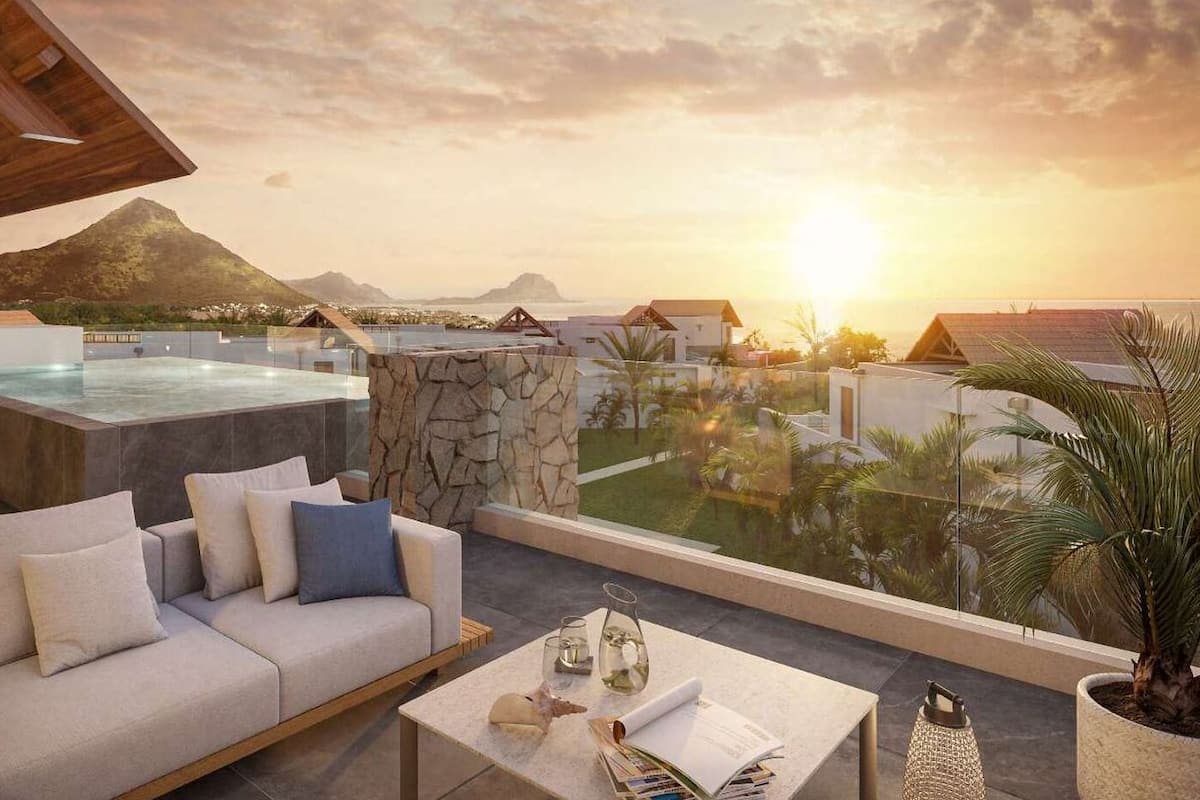 Loftsleilighet | Utsikt mot strand/hav