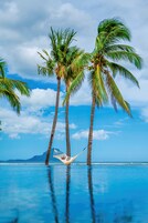 2 outdoor pools, pool umbrellas, pool loungers