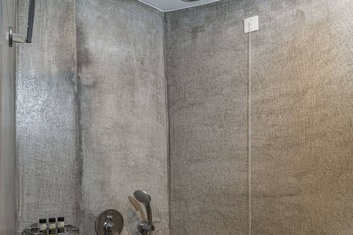 elegant suite private pool | bathroom | shower, hair dryer, towels