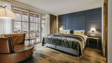 Luxe beddengoed, een minibar, een kluis op de kamer