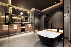 Junior Suite, Balcony, Mountain View | Bathroom | Rainfall showerhead, hair dryer, bathrobes, slippers - Grand Tirolia Kitzbühel - Member of Hommage Luxury Hotels Collection (Kitzbuhel)