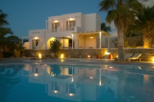 Seasonal outdoor pool, open 10:00 AM to 8:00 PM, pool umbrellas