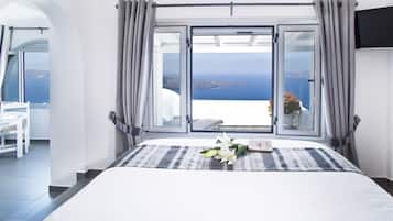 Suite Junior (Caldera View) | 1 camera, biancheria da letto di alta qualità, una cassaforte in camera