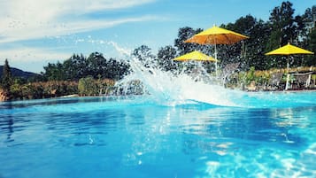 Seasonal outdoor pool, open 10 AM to 6 PM, pool umbrellas, sun loungers