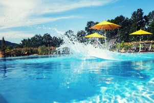 Seasonal outdoor pool, open 10 AM to 6 PM, pool umbrellas, sun loungers