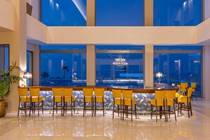 2 bars/lounges, 2 poolside bars