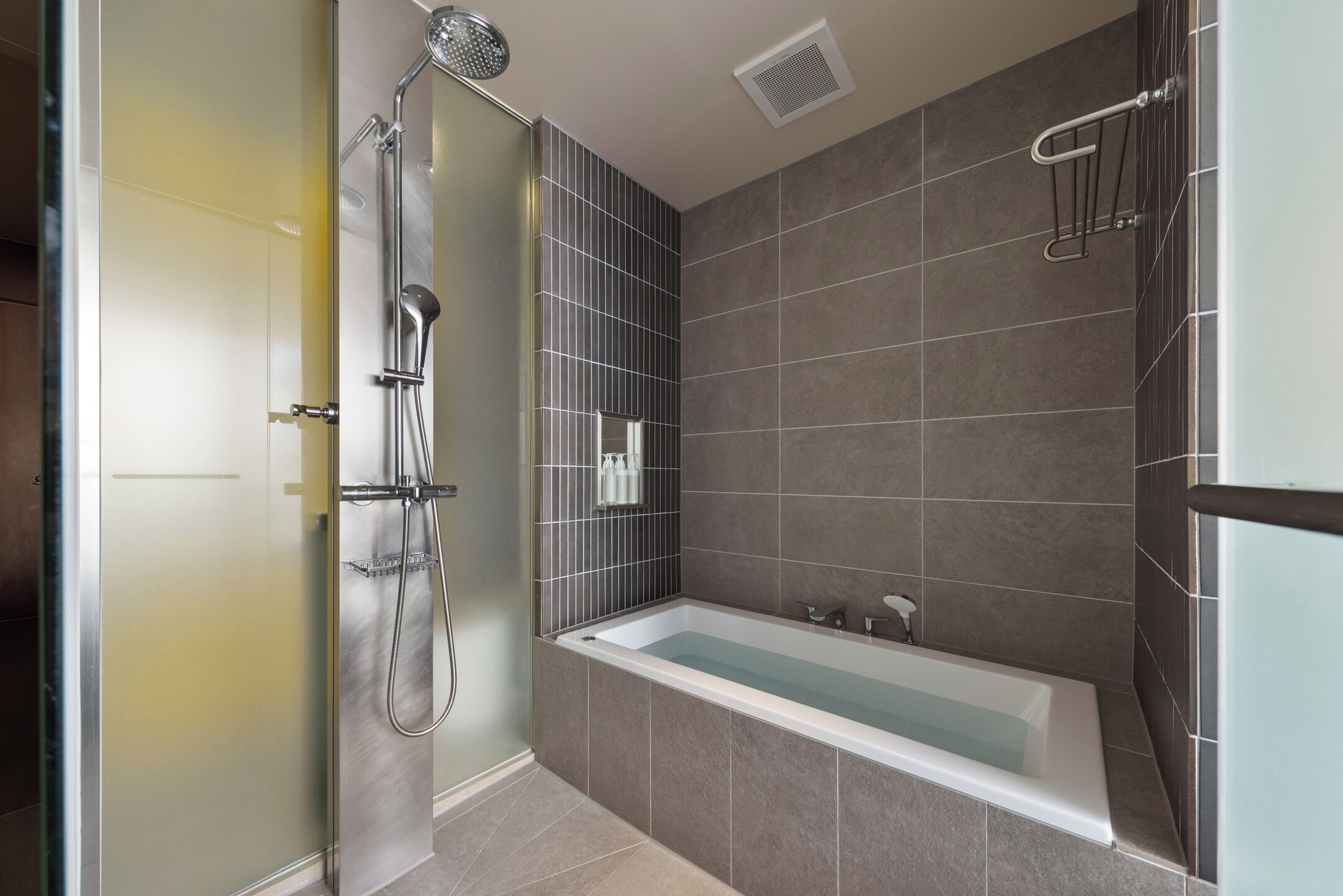 executive king with 100inc projector [mini bar /sauna/ club lounge access inclusive] | bathroom | separate bathtub and shower, designer toiletries, hair dryer, bathrobes