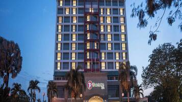 A Travelodge hotel with a modern facade, multiple floors, and a prominent entrance.