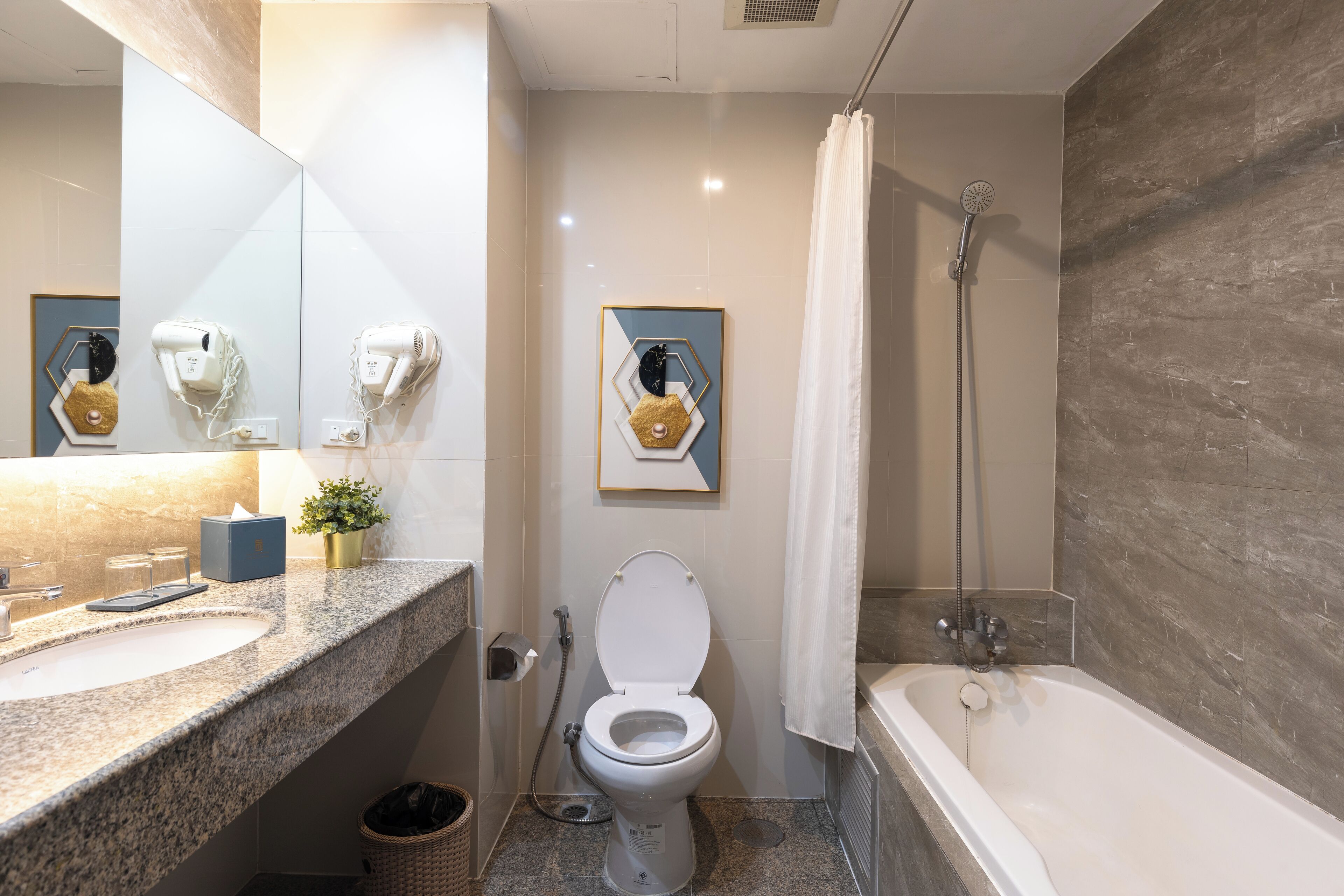 combined shower/bathtub, free toiletries, hair dryer, bathrobes