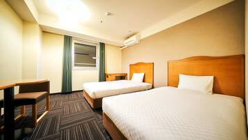 Standard Twin Room | Select Comfort beds, in-room safe, desk, blackout curtains