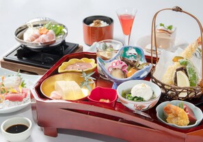 A variety of Japanese dishes arranged on a tray. - Kanku Izumiotsu Washington Hotel (Izumiotsu)