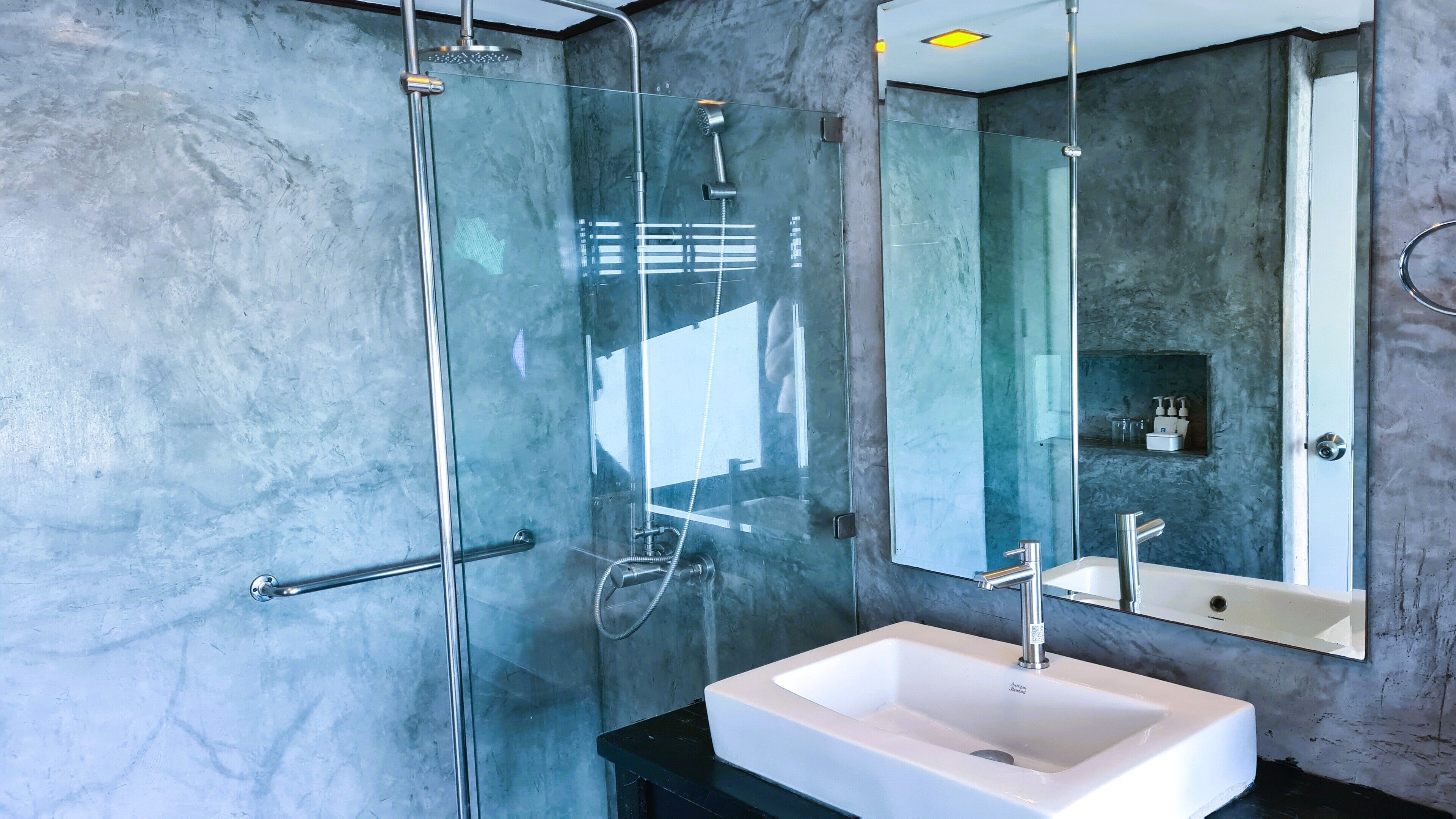 exclusive villa, 1 king bed, ocean view | bathroom | shower, free toiletries, hair dryer, slippers