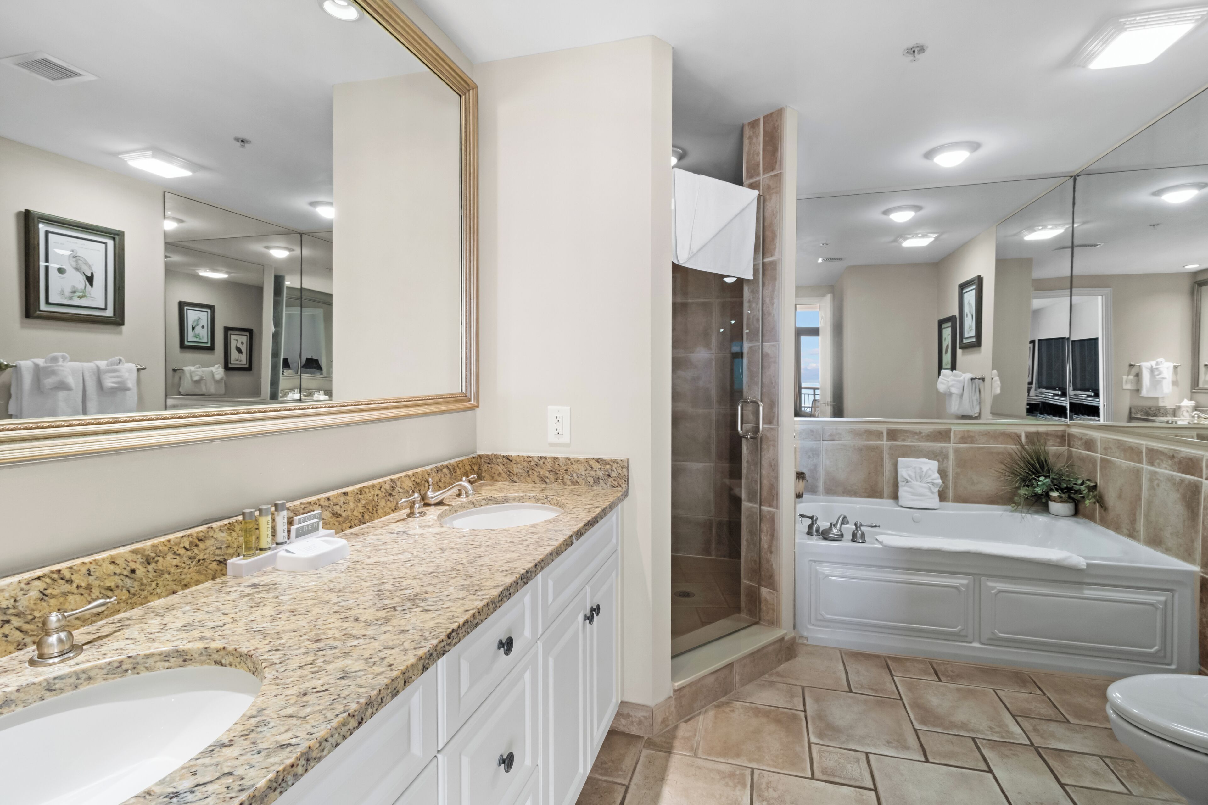 calabash oceanfront one bedroom luxury condo | bathroom | hair dryer, towels, soap, shampoo