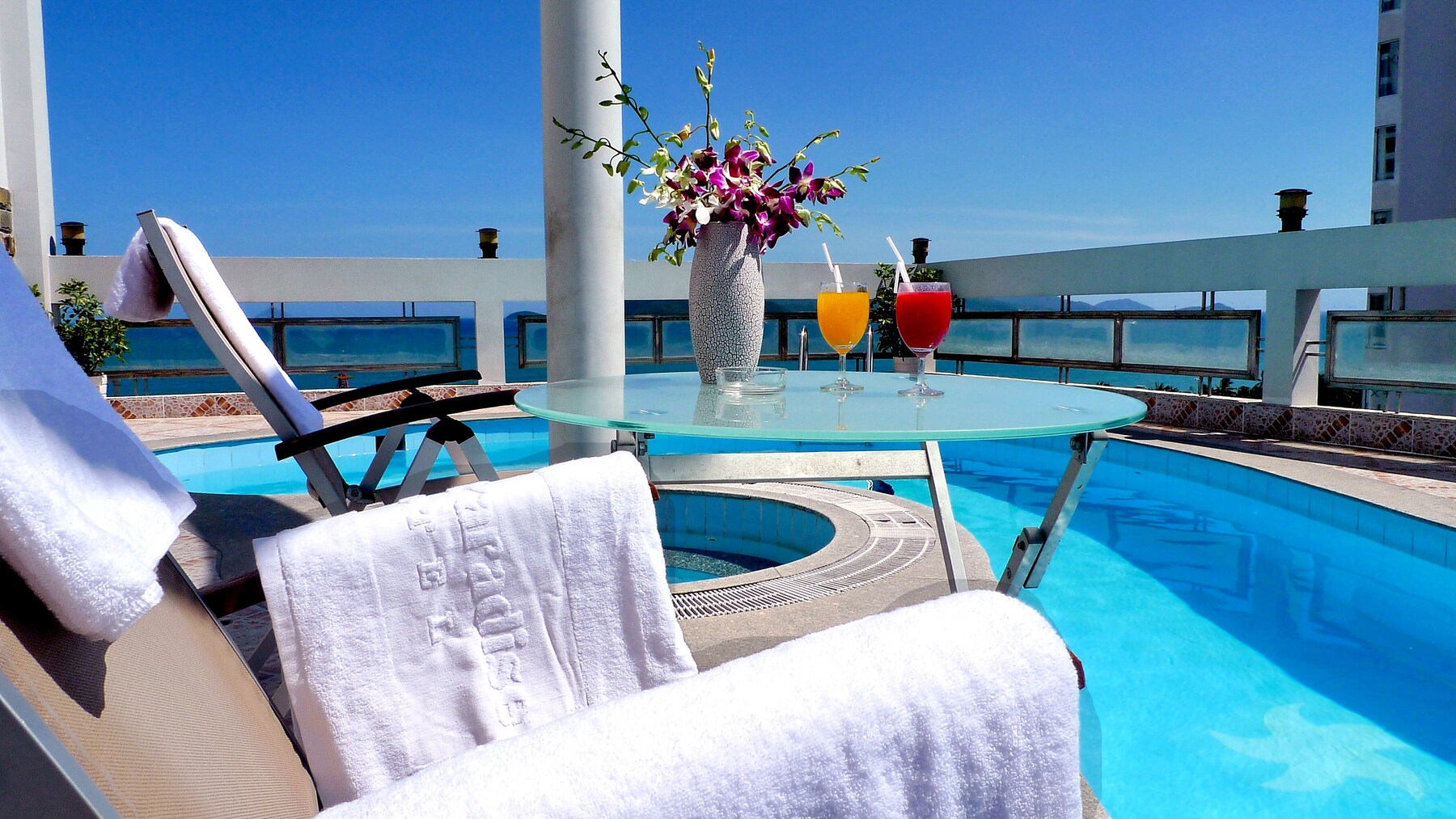 Outdoor pool, pool umbrellas, pool loungers