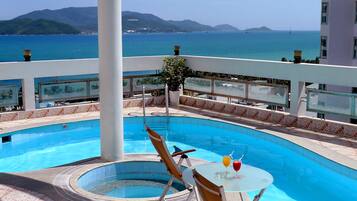 Outdoor pool, pool umbrellas, sun loungers