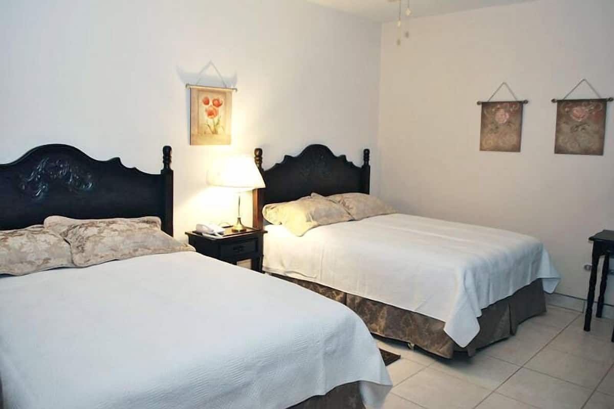 Superior Quadruple Room, 2 Queen Beds | Premium bedding, in-room safe, individually decorated