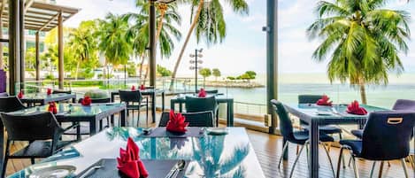 Breakfast, lunch, dinner served; beach views