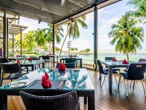 Breakfast, lunch, dinner served; beach views
