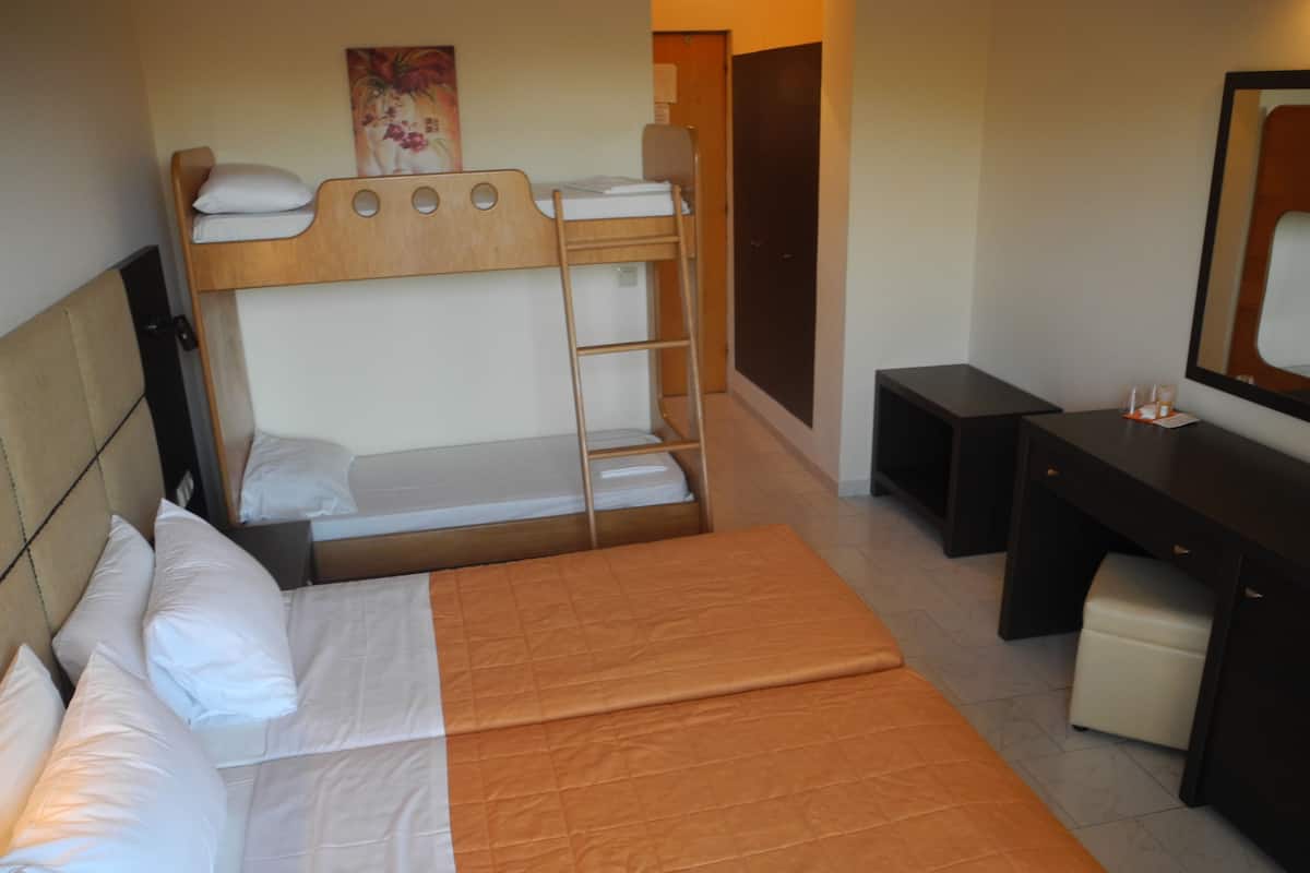 Family Double or Twin Room | In-room safe, blackout drapes, iron/ironing board, rollaway beds