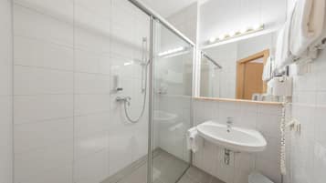 Shower, free toiletries, hair dryer, towels