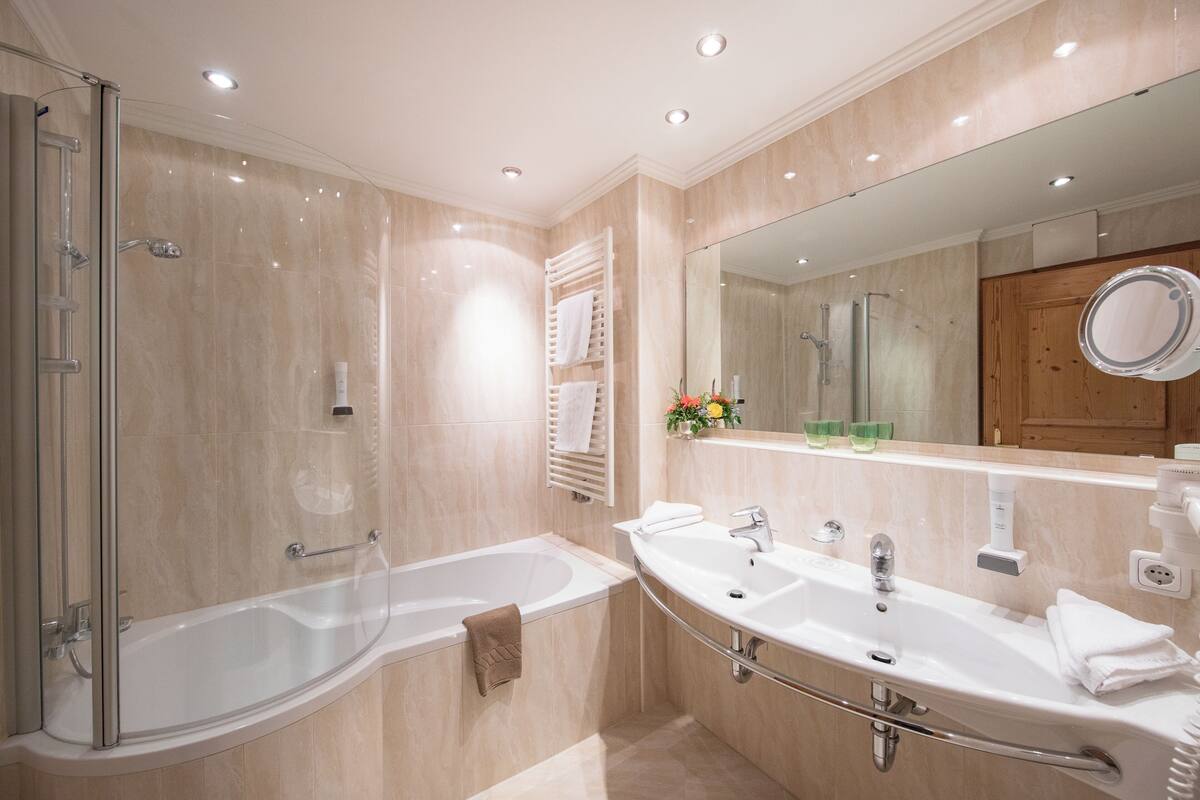 hair dryer, towels, soap, shampoo